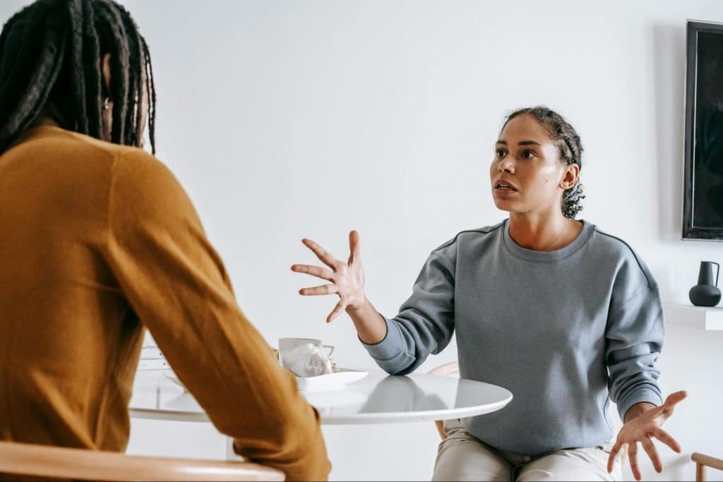 A woman nagging a man