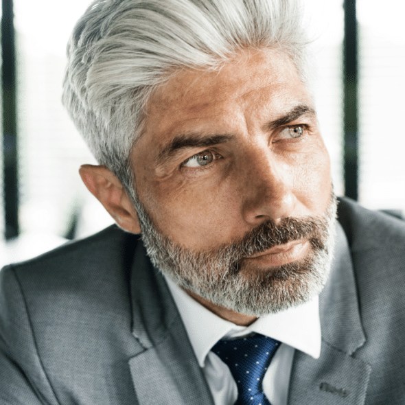 A mature man thinking deeply