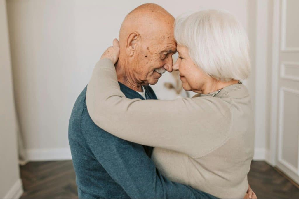 A man and woman looking at each other