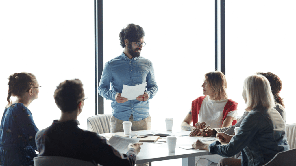 A man giving a speech at work