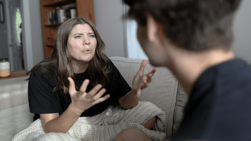 A woman confronting her boyfriend