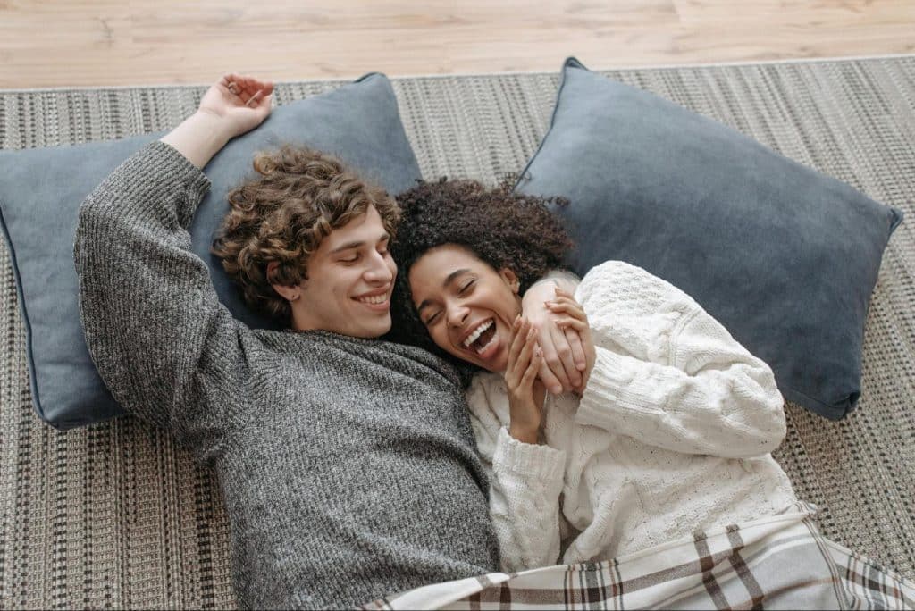 Couple laying on the floor