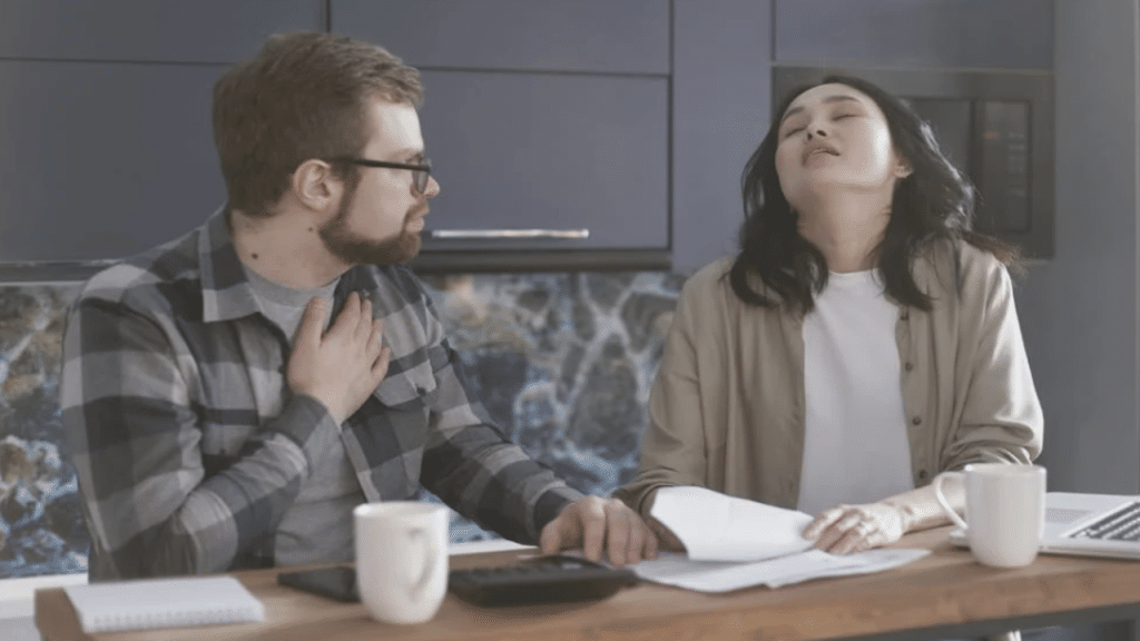 A couple stressed over the bills