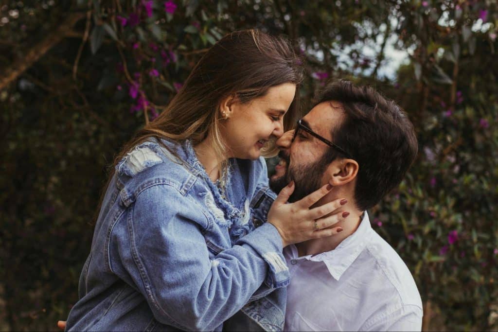 A man and woman kissing each other