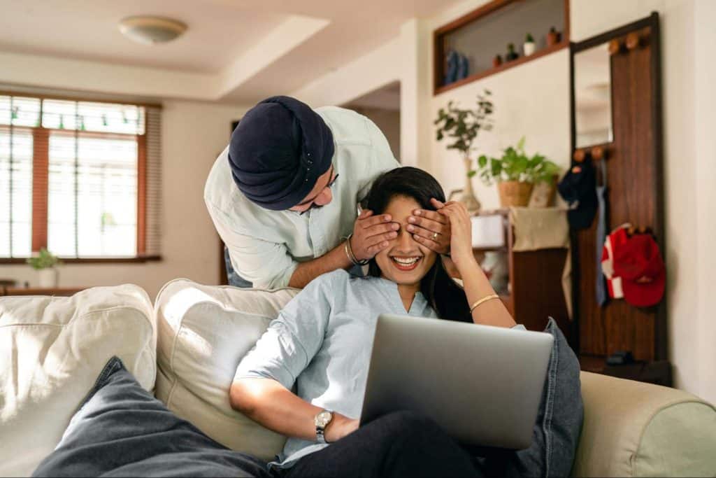 A man being playful with his partner