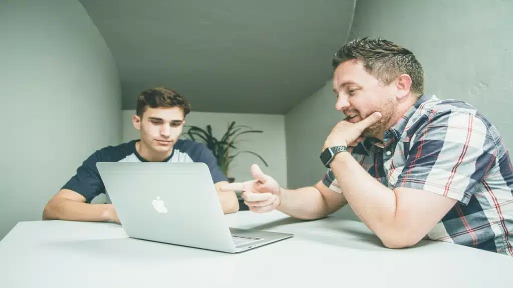 A man mentoring a younger guy
