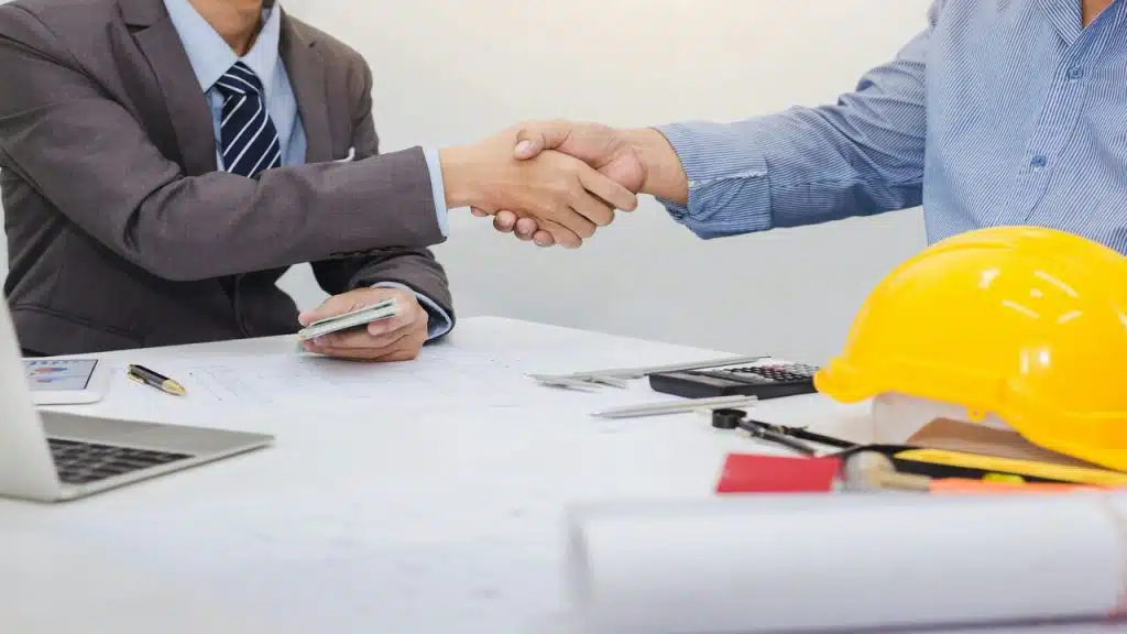 Business partners shaking hands