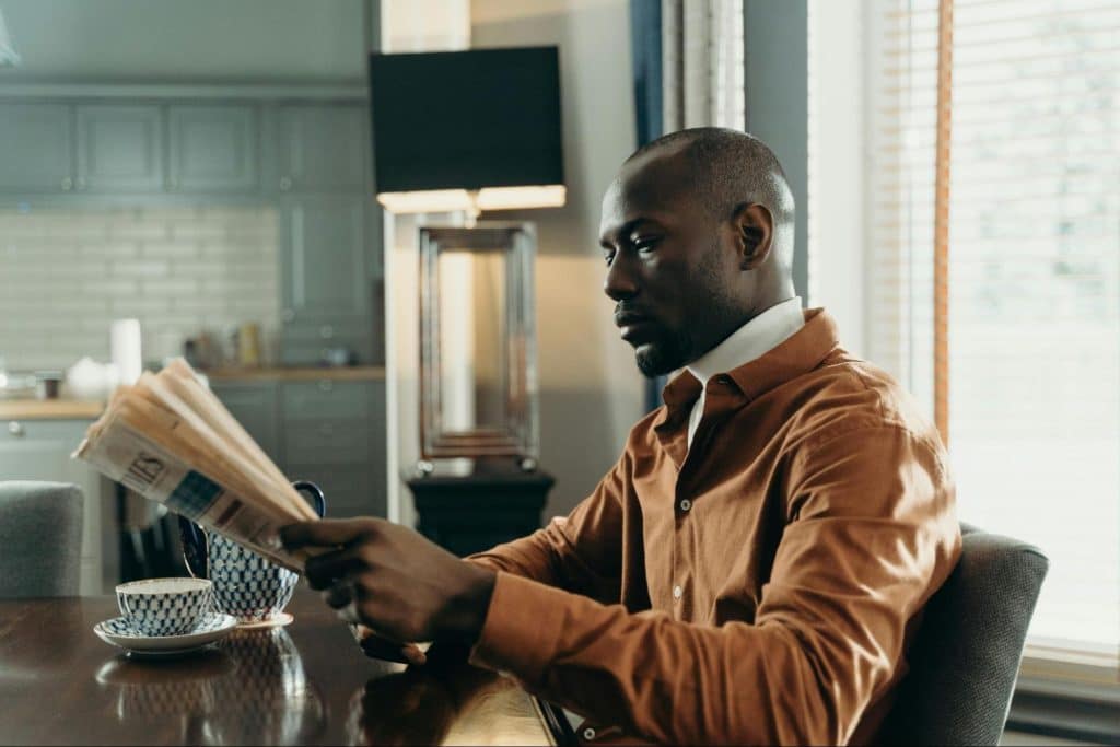 A man reading a newspaper