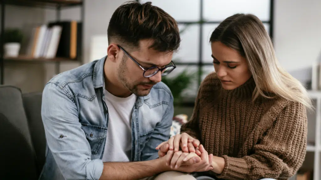 A couple praying together