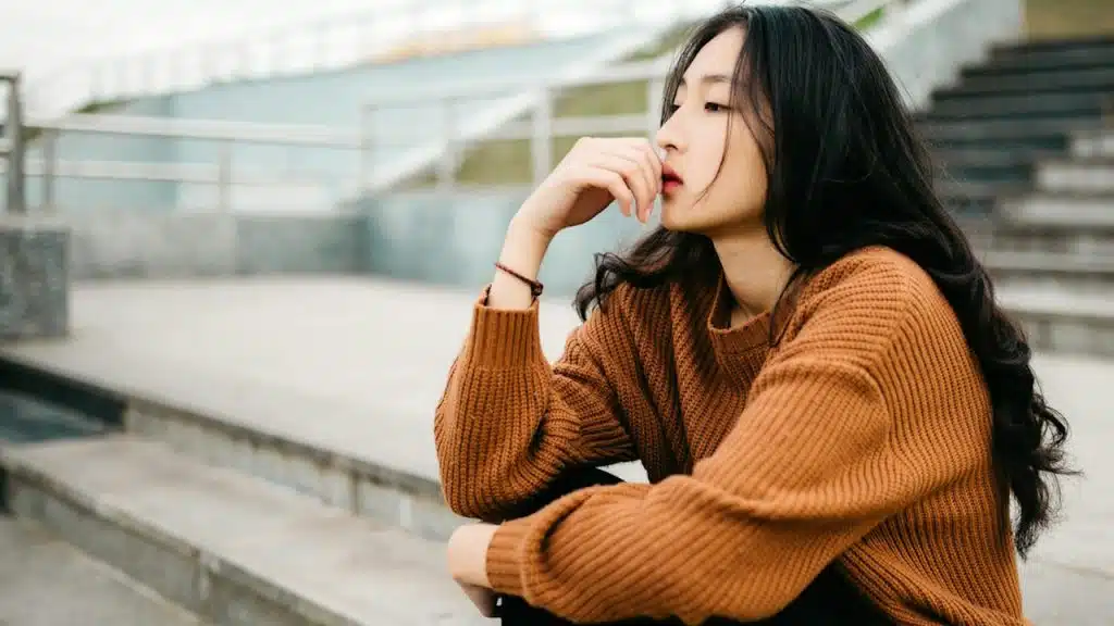 A woman lost in thought.