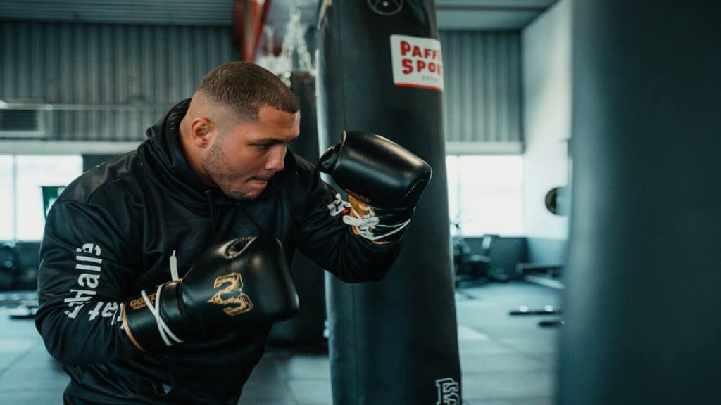 A man boxing at a gym