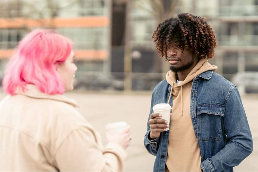 A man looking at the woman