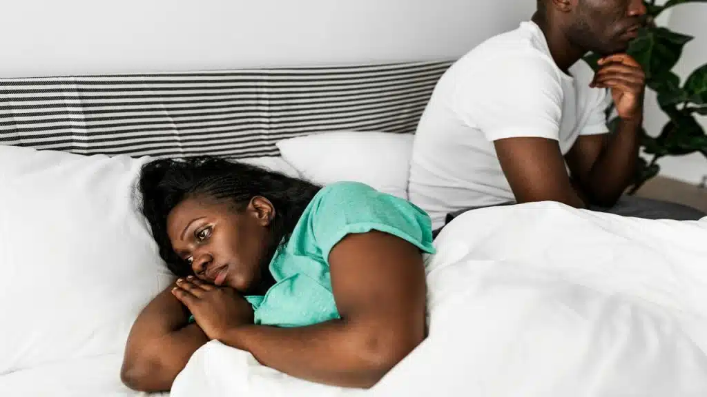 A woman refusing to look at her husband 