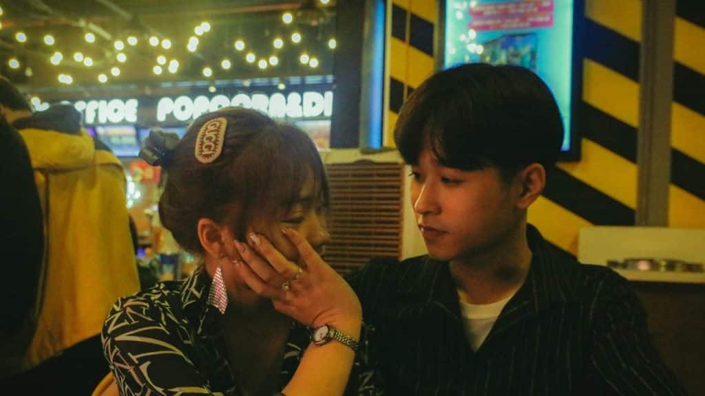 A man and woman looking in the eyes of each other.