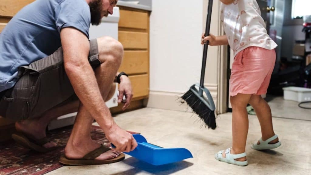 Man helping with kids and household chores