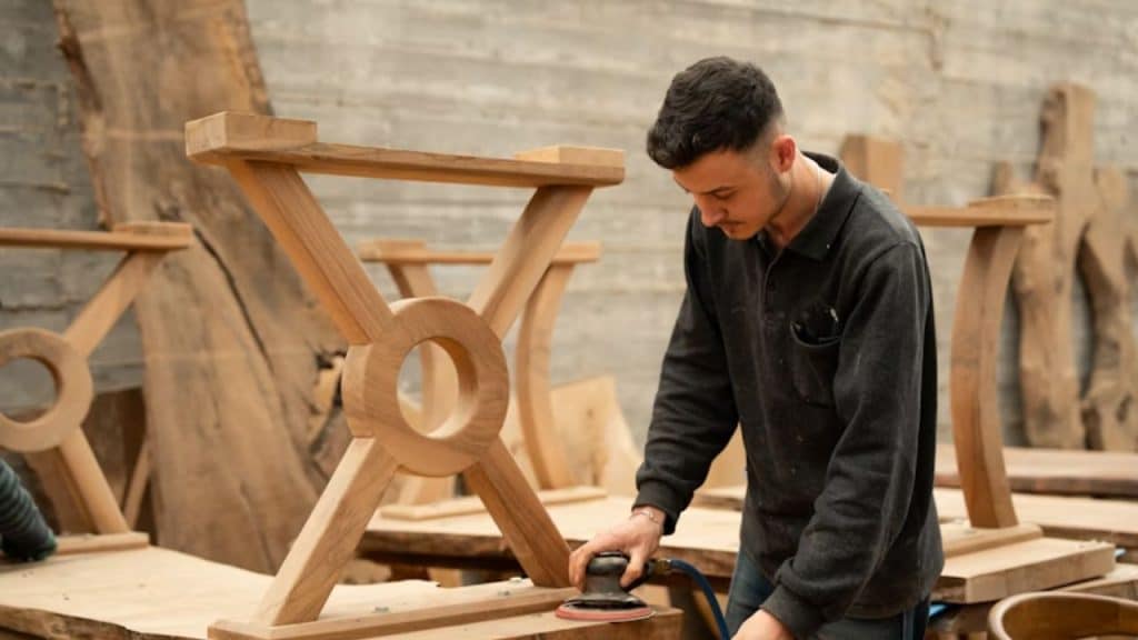Man working on woodworking project in a home workshop