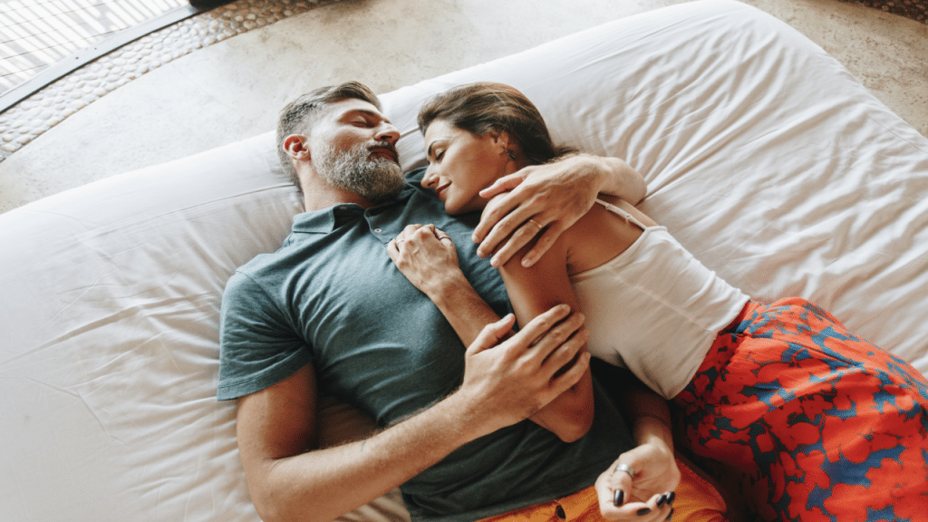 A mature couple relaxing in a hotel room