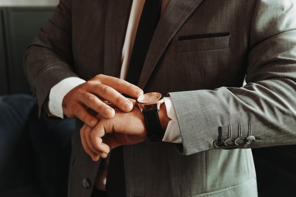 Man in a Suit Wearing a Wristwatch