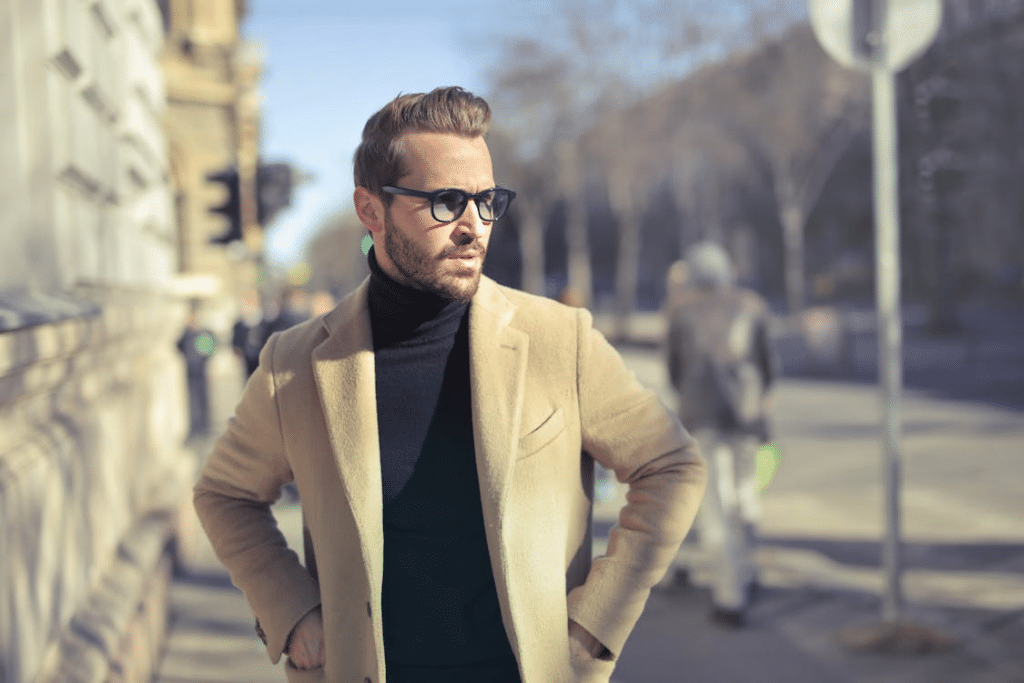 Man Wearing Black Turtleneck Top With Jacket on Road