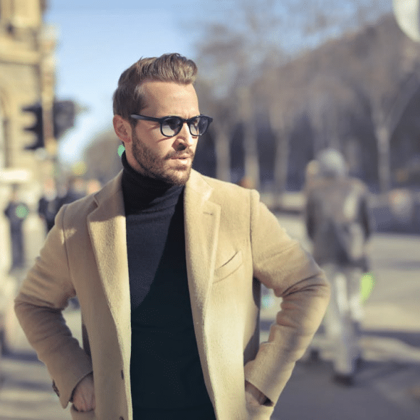 Man Wearing Black Turtleneck Top With Jacket on Road