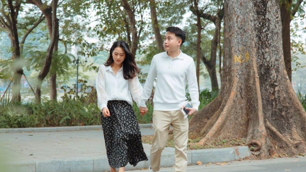 Man and woman walking together without smiling