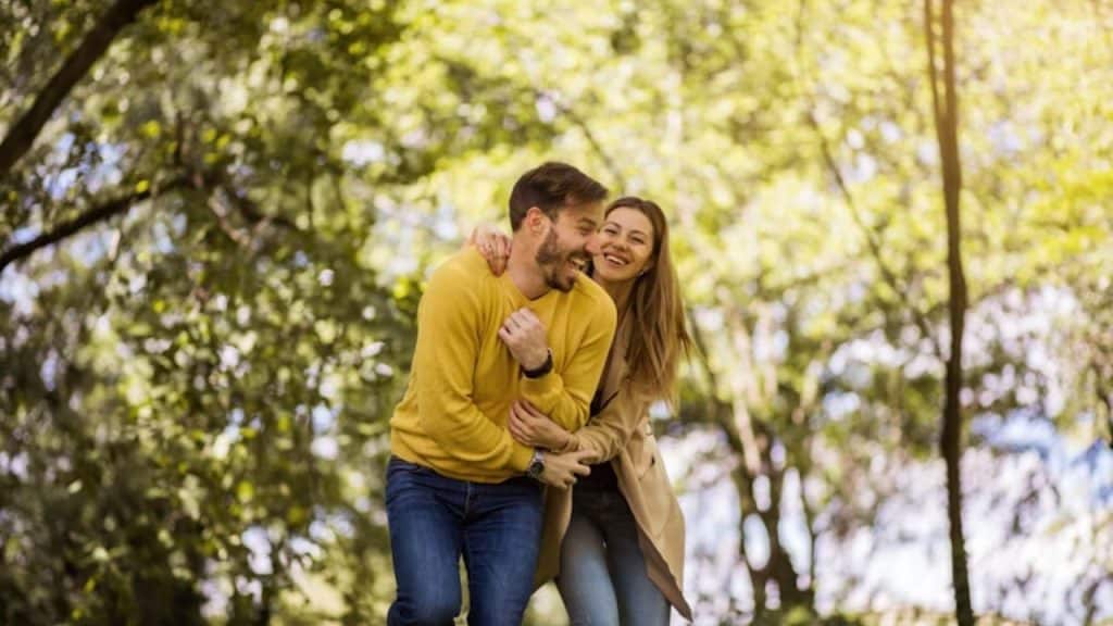 Couple laughing together during a casual outing