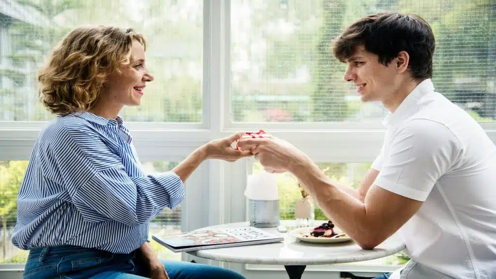 A man giving his wife a gift