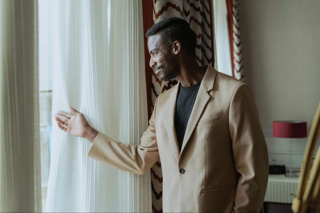 A man looking outside the window