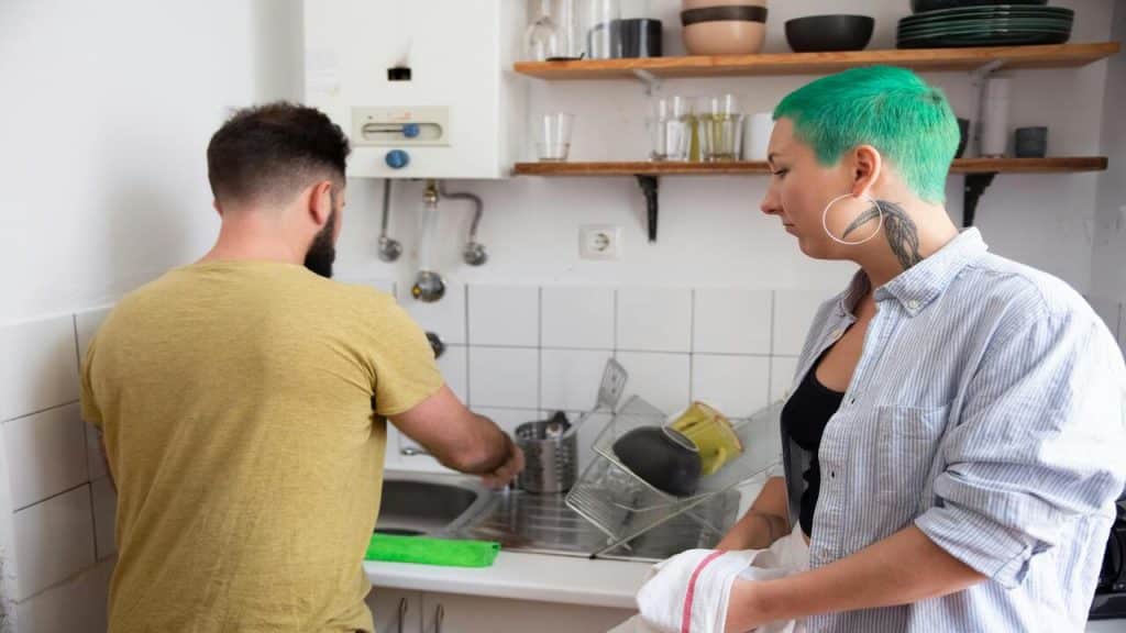 A couple doing the dishes together