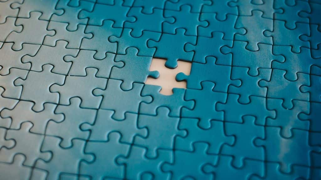 A puzzle with a missing piece