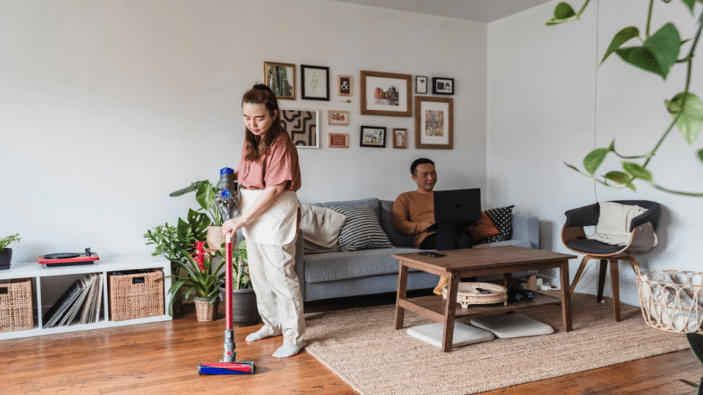 A couple busy at home