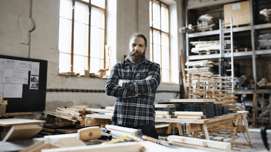 A carpenter at his workshop