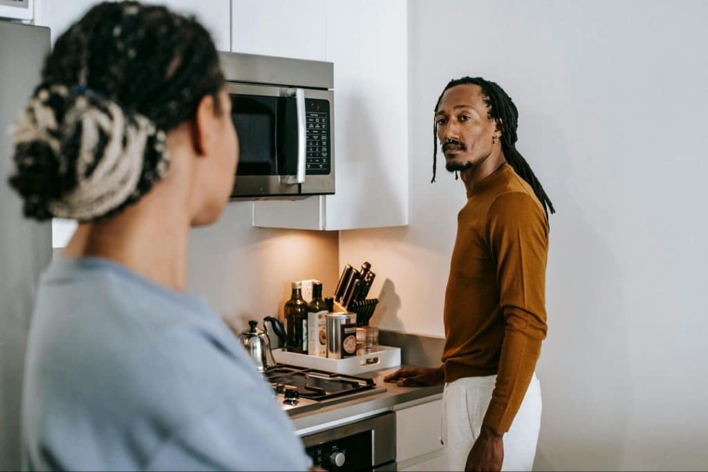 A man and woman looking at each other