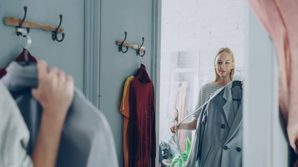 A woman trying on clothes