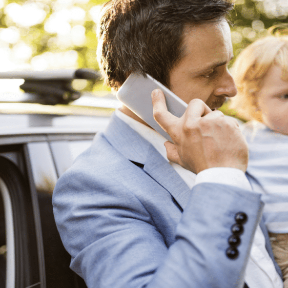 A busy dad on the phone