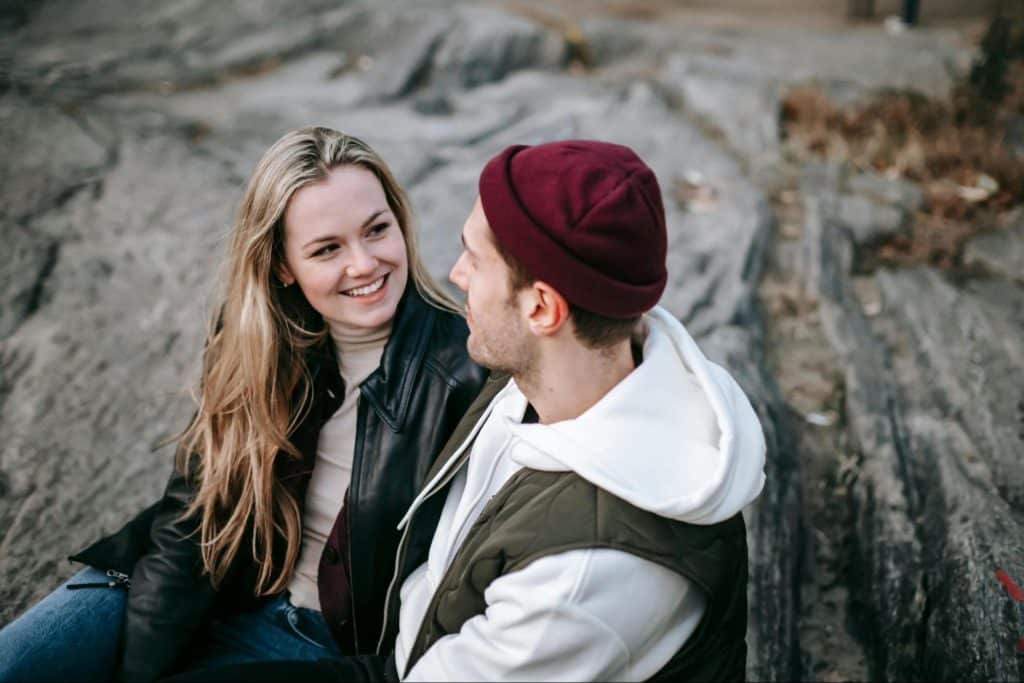 A man and woman looking at each other
