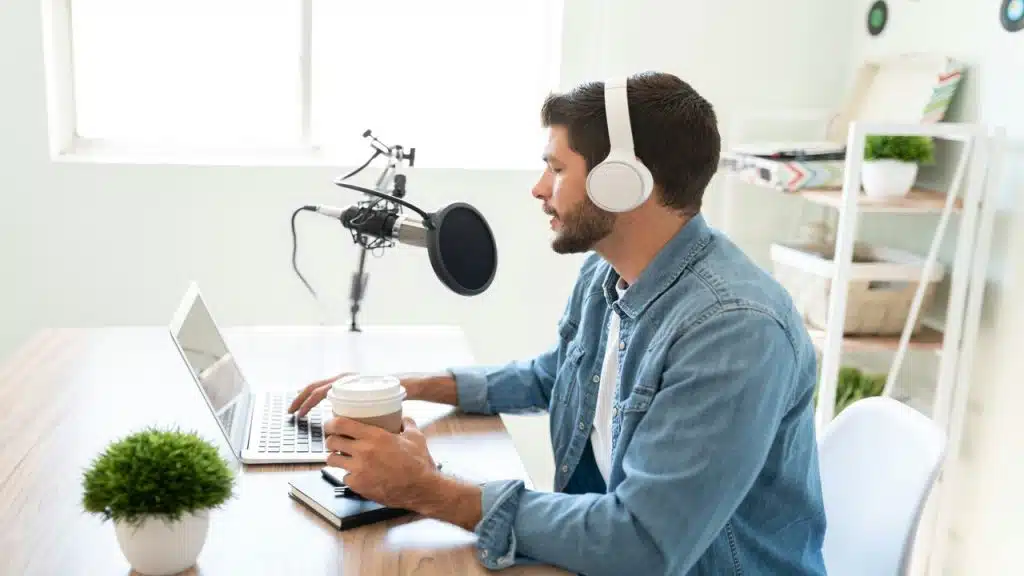 A man talking to a microphone