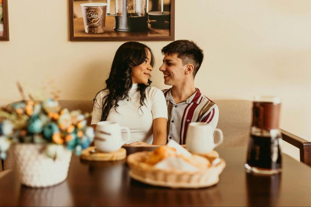 A man and woman looking at each other
