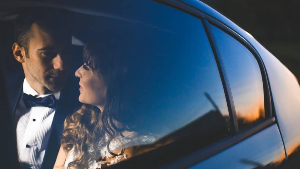 A man and a woman in a car.