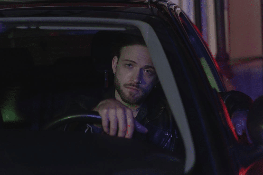 A Man Driving a Car