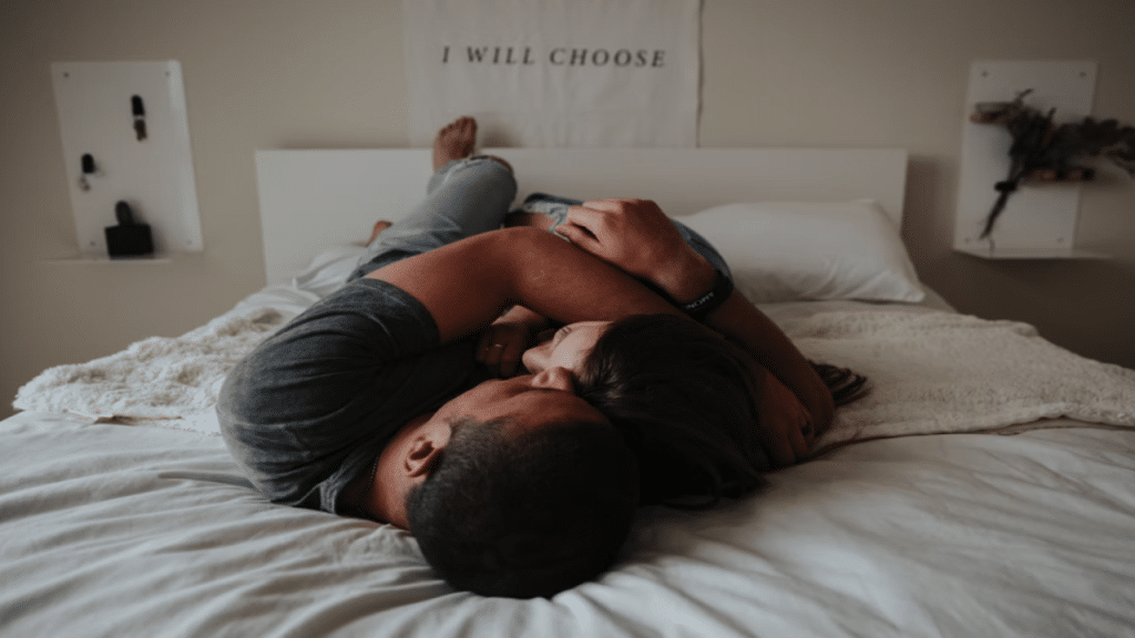 A couple cuddling at home