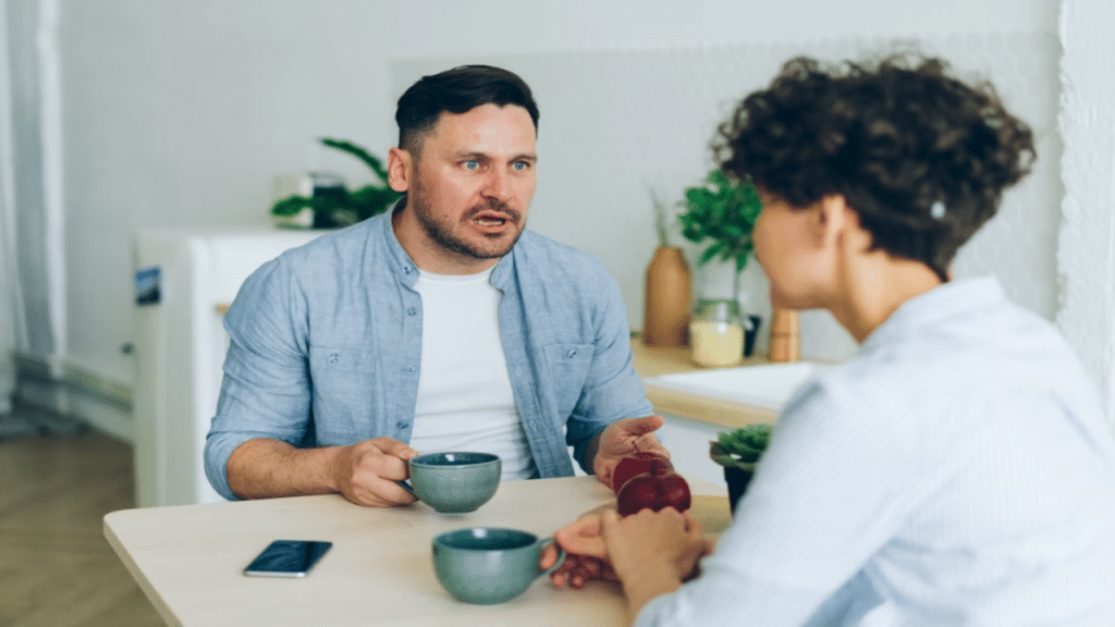 A couple arguing while eating