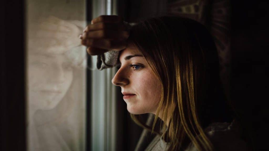 A woman looking out the window