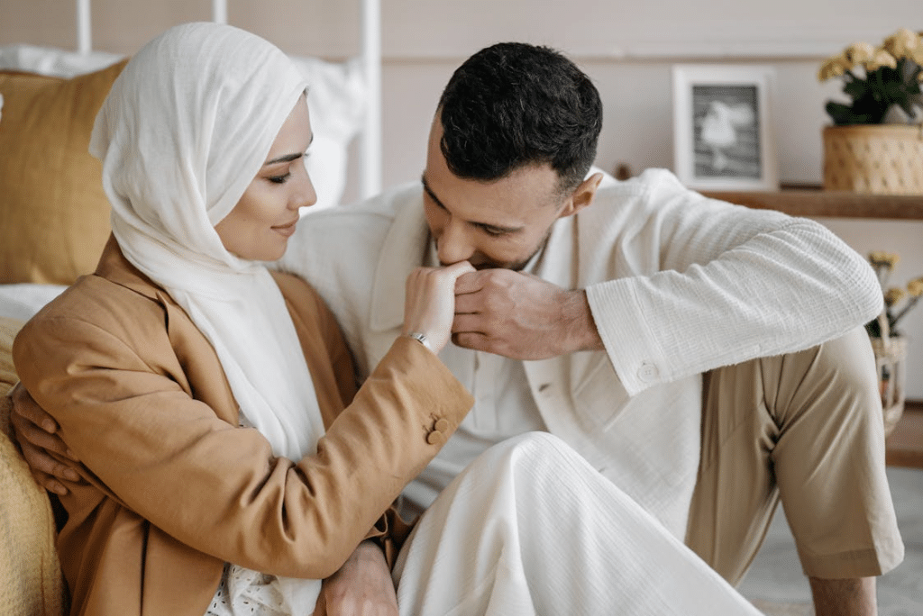 Man Kissing the Hand of a Woman