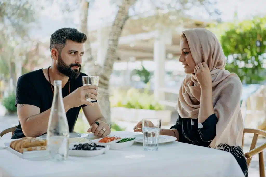 A man looking at the woman