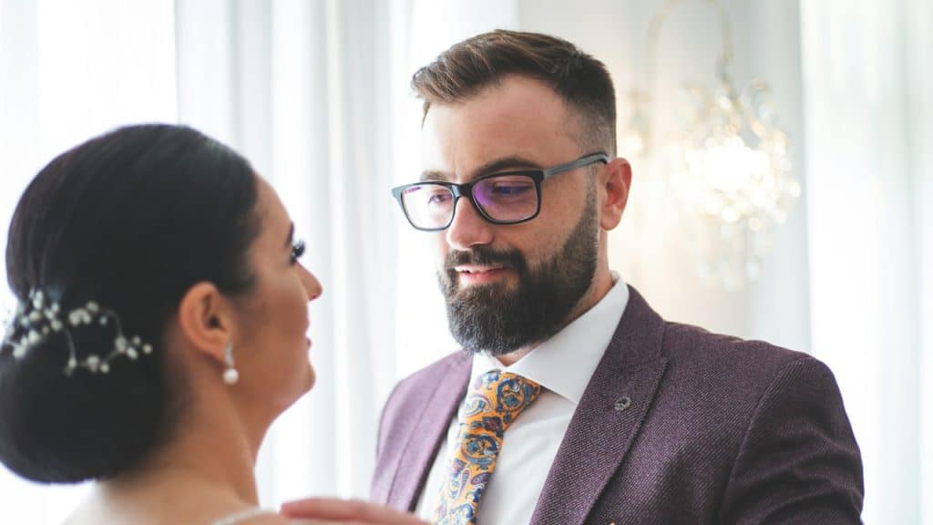 A man admiring the beauty of his wife.
