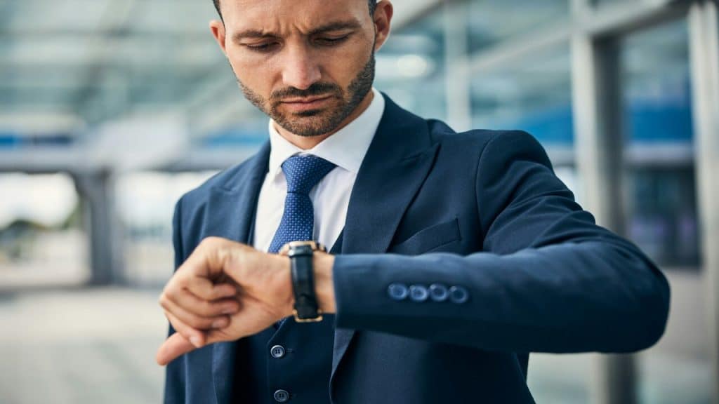 A man checking the time