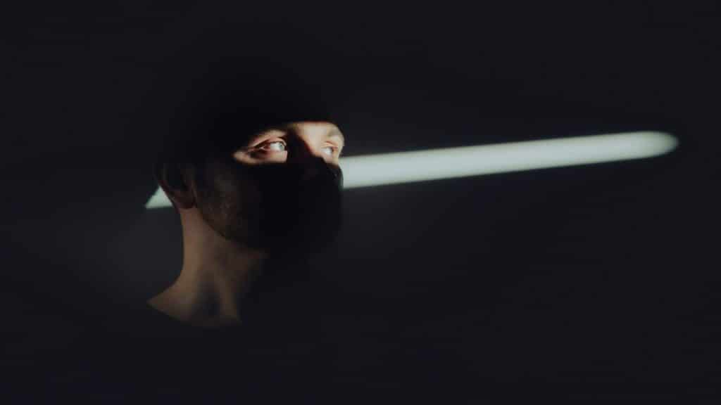 A man hiding in the bedroom