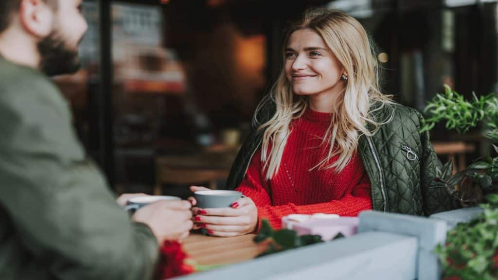 A couple focusing on each other during their date
