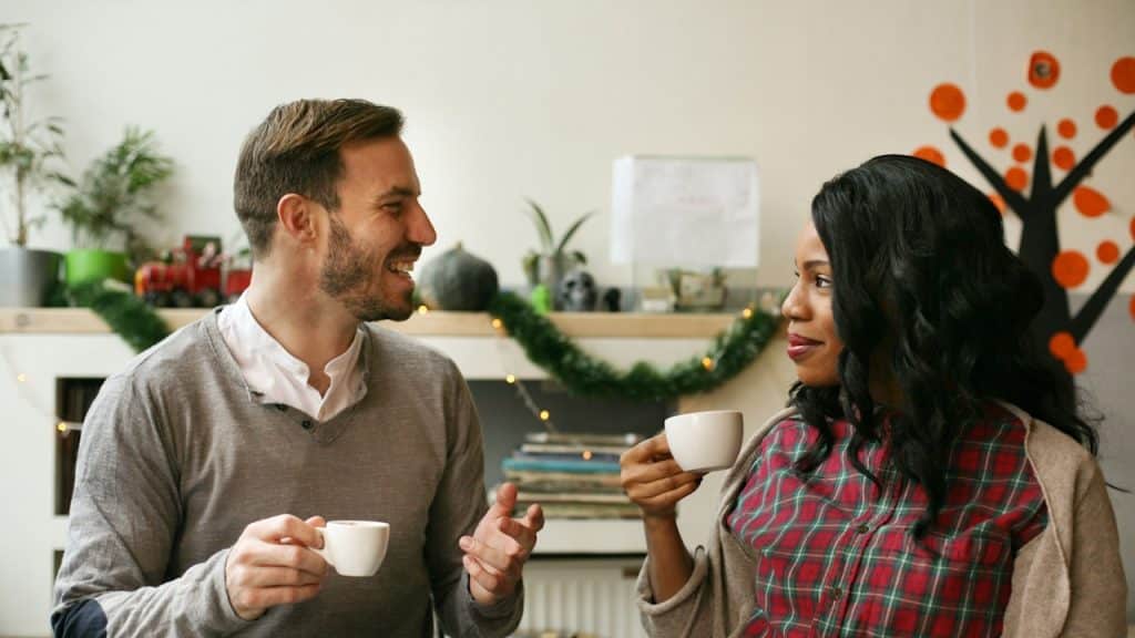 A business couple having a conversation on a tea break.